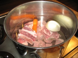 2) water raw meat onions and carrots in the pan (2)